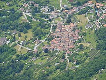 Rovio village viewed through a telephoto lens from near the summit of Monte Generoso Rovio seen from Monte Generoso.jpg