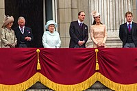 With Queen Elizabeth II and other members of the Royal family on the balcony of Buckingham Palace. (5 June 2012)