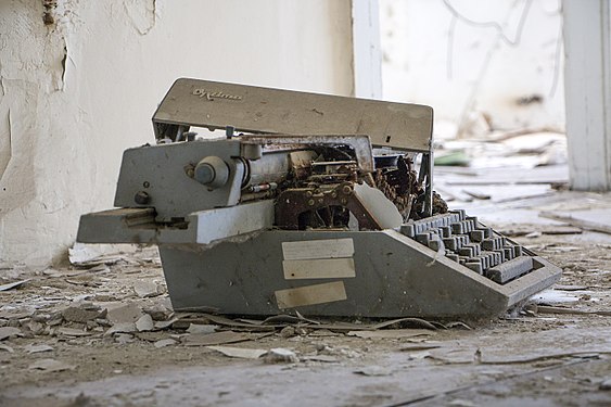 Rusty Optima typewriter in an hungarian abandoned factory