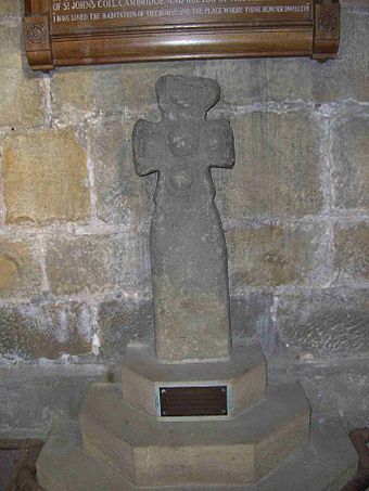 The 10th century Saxon cross is now in the nave of St. Nicholas church, High .