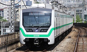 Seoul Metro Line 2 train arriving at Guro Digital Complex (2-09).jpg