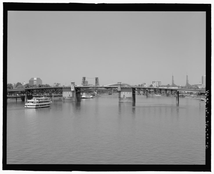 File:South elevation of Morrison Bridge, looking north (downstream), with Convention Center Towers and steel bridge in the background. - Morrison Bridge, Spanning Willamette River on Morrison HAER OR-100-8.tif