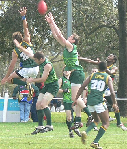 An Irish player takes an overhead pack mark in the 2008 AFL International Cup