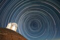 Star trails over the ESO 3.6-metre telescope.jpg