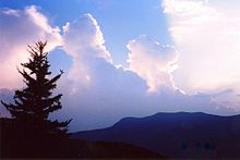 Cumulonimbus rising above the Black Mountains (North Carolina). Thunderstorm over the Black Mountains - panoramio.jpg
