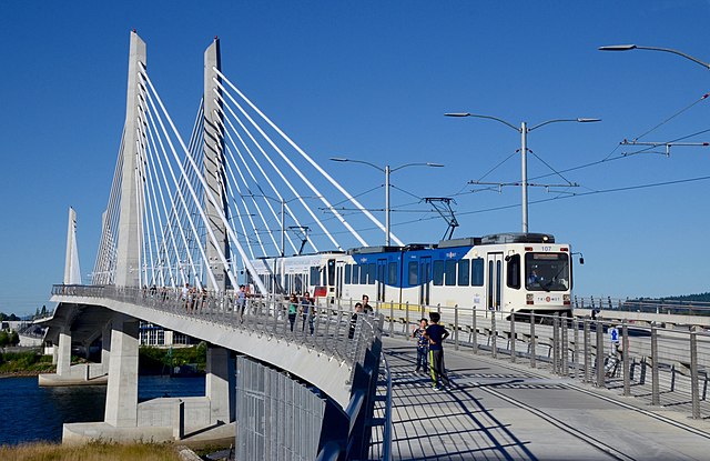 A two-car Orange Line train on Tilikum Crossing in 2016