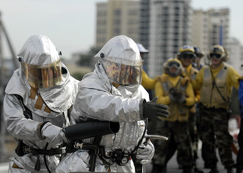 File:US Navy 090630-N-9520G-021 Sailors assigned to the air department crash and salvage team of the amphibious assault ship USS Essex (LHD 2) fight a simulated class bravo fire on the flight deck of the ship.jpg