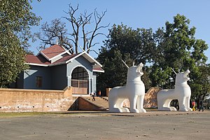 A historic dual statue of dragon lion Kanglasha in front of the inner entrance gate to the Kangla Palace of Imphal, which was once the ruling seat of the Meitei kings in old days. Uttra Sanglen.JPG