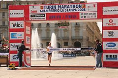 Sicari crossing the line to win the 2008 Turin Marathon Vincenza Sicari - 2008 Turin Marathon finish.jpg