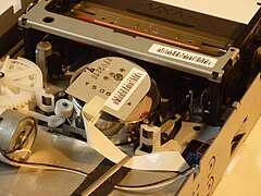 VXA-1 tape drive with tape loaded, view from rear left