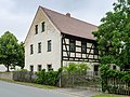 Residential house of a two-sided courtyard