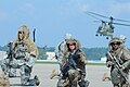 101st Airborne soldiers wearing ghillie suits resting with CH-47 overhead during Fort Campbell air show rehearsals 120807-A-ZT847-030.jpg
