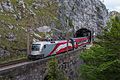Električna lokomotiva Taurus 1116.249 z Railjet RJ 539 izstopa iz predora Weinscheinwand 23. maja 2017