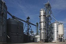 Grain elevators along W 1st St. A377, Schaller, Iowa, USA, grain elevators, 2016.jpg