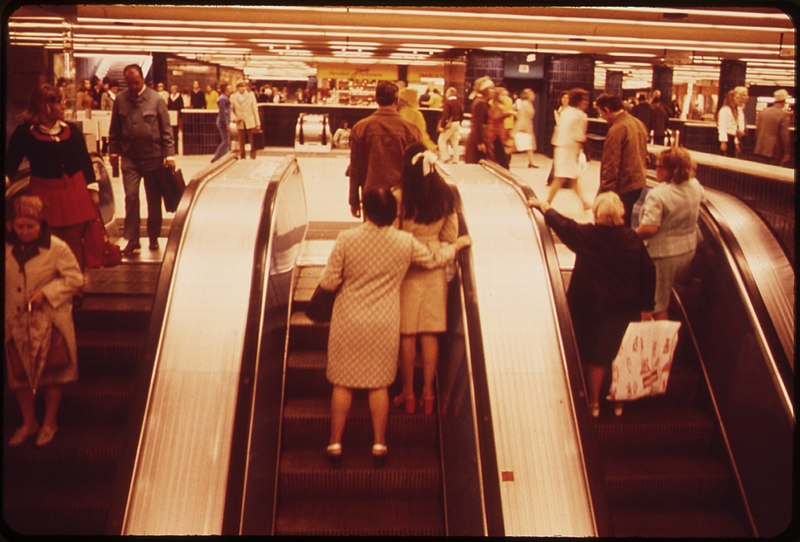 File:ARRIVALS AND DEPARTURES AT AN UNDERGROUND STATION. ALL HAVE ESCALATORS. SOME ESCALATORS WORK ONLY WHEN ACTIVATED BY... - NARA - 551885.jpg