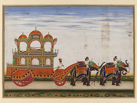 A two-tiered carriage drawn by four elephants