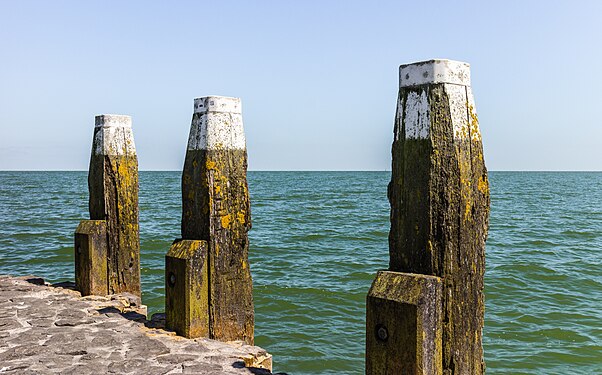 Afsluitdijk and surroundings. Mooring posts in the IJsselmeer.