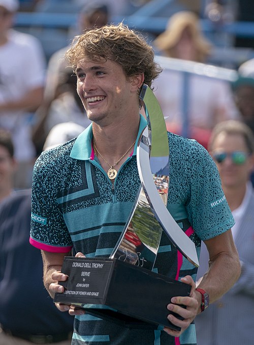 Alexander Zverev holding the trophy after winning the 2018 title.