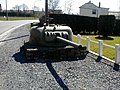 Tourelle de char Sherman sur la route à l'entrée de Bastogne