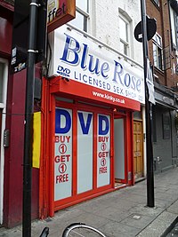 In May 2000, the sale of hardcore pornographic videos was legalized in licensed sex shops across the United Kingdom. Blue Rose sex shop, Camden.jpg