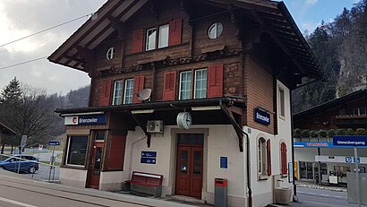 Three-story building with gabled roof