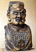 Bust of a Buddhist guardian figure, from China, Yuan Dynasty, 14th century CE. The British Museum