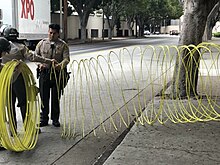California Highway Patrol officers fencing off the Quad, May 2, 2024 CHP Fencing.jpg