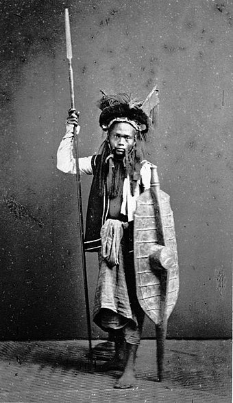Nias warrior armed with spear and shield