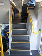 Stairs leading to upper deck from vestibule