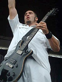 Lowery with Sevendust in 1998 Clint Lowery performing in 1998 as Sevendust guitarist.jpg