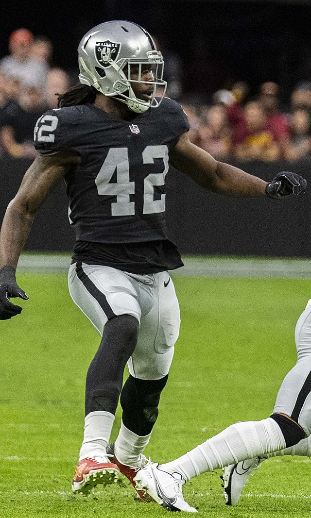 Las Vegas Raiders inside linebacker Cory Littleton (42) and Divine Deablo  (5) during the second half of an NFL football game against the Philadelphia  Eagles, Sunday, Oct. 24, 2021, in Las Vegas. (