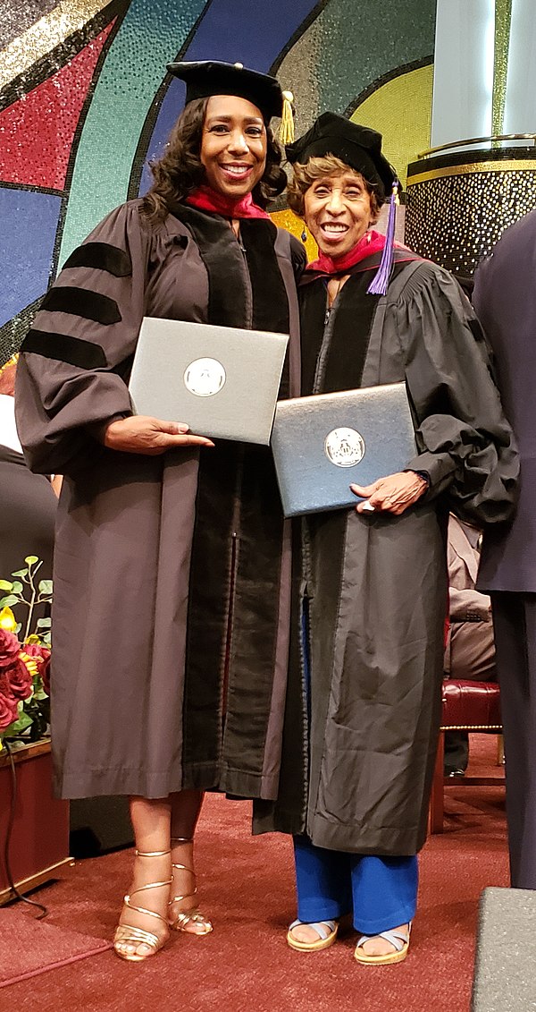 Dawnn Lewis and Marla Gibbs receiving honorary Doctor of Humane Letters degrees from Next Dimension University on August 17, 2019.