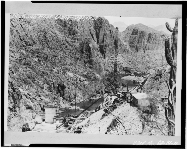 File:Downstream face of Mormon Flat Dam under construction. Cement storage shed is at center right. Photographer unknown, September 1924. Source- Salt River Project. - Mormon Flat HAER ARIZ,7-PHEN.V,4-10.tif