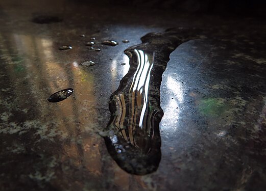 Drops of water on the table of kitchen