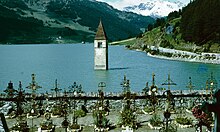 The ancient half-submerged bell-tower in the lake Lago di Resia (Reschensee in German), which borders Curon Venosta, is featured in the TV series.