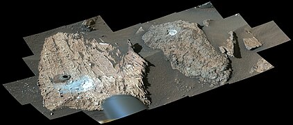 Perseverance's Mastcam-Z views the "Cheyava Falls" workspace. On the left, a black hole is visible that appeared after sample collection.[7]