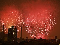 New York City's fireworks display, shown above over the East Village, is sponsored by Macy's and is the largest[33] in the country.