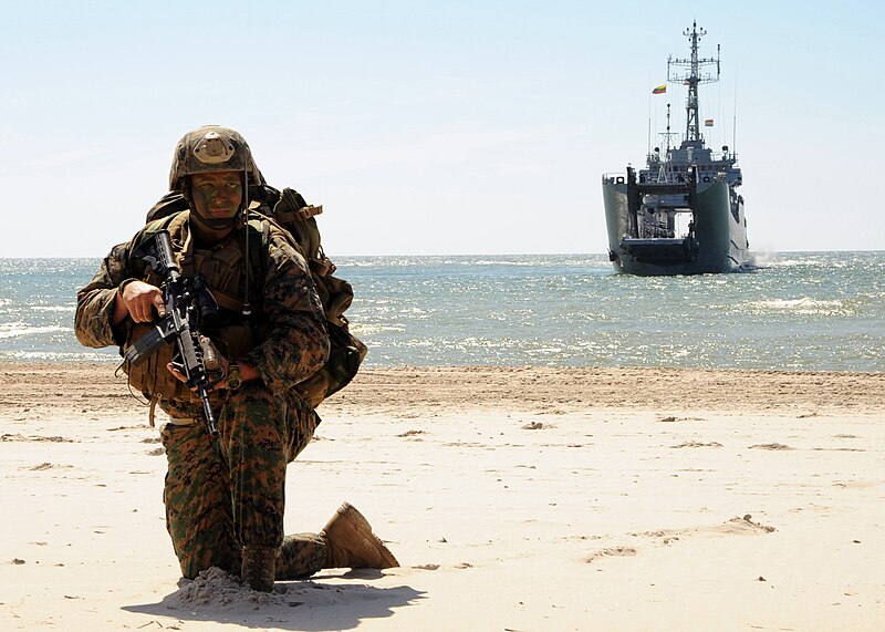 File:Flickr - Official U.S. Navy Imagery - A Marine holds position on a beach with the Polish navy transport mine-layer OPR Krakow in the background during a Baltic Operations 2012 amphibious operation exercise..jpg