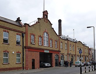 Street frontage of the former W & G Du Cros Works in Warple Way, Acton, London Former Du Cros motor car factory (geograph 2768081).jpg