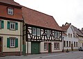 Göllheim, Hauptstraße 26: Hofanlage; barockes Wohnhaus mit Zierfachwerk, 1712 (?)