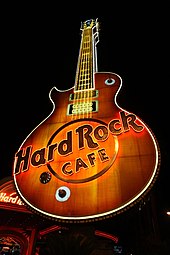 Sign of the Hard Rock Cafe Las Vegas, where the dress is displayed. Hard Rock Cafe guitar sign (Las Vegas).jpg