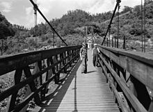 Coal miners' children cross a footbridge into Hazard, Kentucky, July 1940. Photograph by Marion Post Wolcott. Hazard Kentucky bridge2.jpg