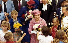 The Queen surrounded by children in Queen Street Mall, Brisbane City, 1982 Her Majesty Queen Elizabeth II in Queen Street Mall, Brisbane City, c 1982.jpg