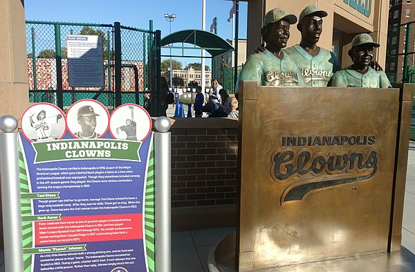 Statues of Toni Stone, Hank Aaron, and Mamie Johnson in the Riley Children's Health Sports Legends Experience at the Indianapolis Children's Museum.