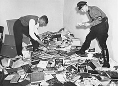 German students and Nazi SA members plunder the library of Dr. Magnus Hirschfeld, Director of the Institute for Sexual Research in Berlin Institut fur Sexualwissenschaft - Bibliothek 1933.jpg