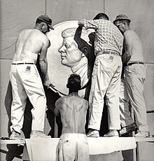 J. Paul Lanza (plaid) and crew installing the JFK medallion on the Memorial. JPaulLanza-JFKMemorial-Hyannis-1.jpg