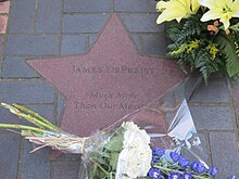 DePreist's star along Portland's Main Street Walk of Stars, showing floral tributes on the day of his death