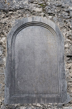 Monument erected by Neptune Blood and his wife Isabella in memory of their children. Kilfenora Cathedral Chancel Blood Monument 2015 09 01.jpg