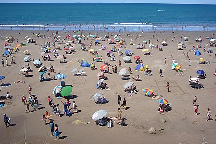 Las Grutas central beach in summer