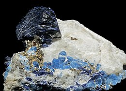 Lazurite, afghanite et pyrite sur calcite (Sar-e-Sang, Vallée de Koksha, Badakhshan - Afghanistan) .jpg